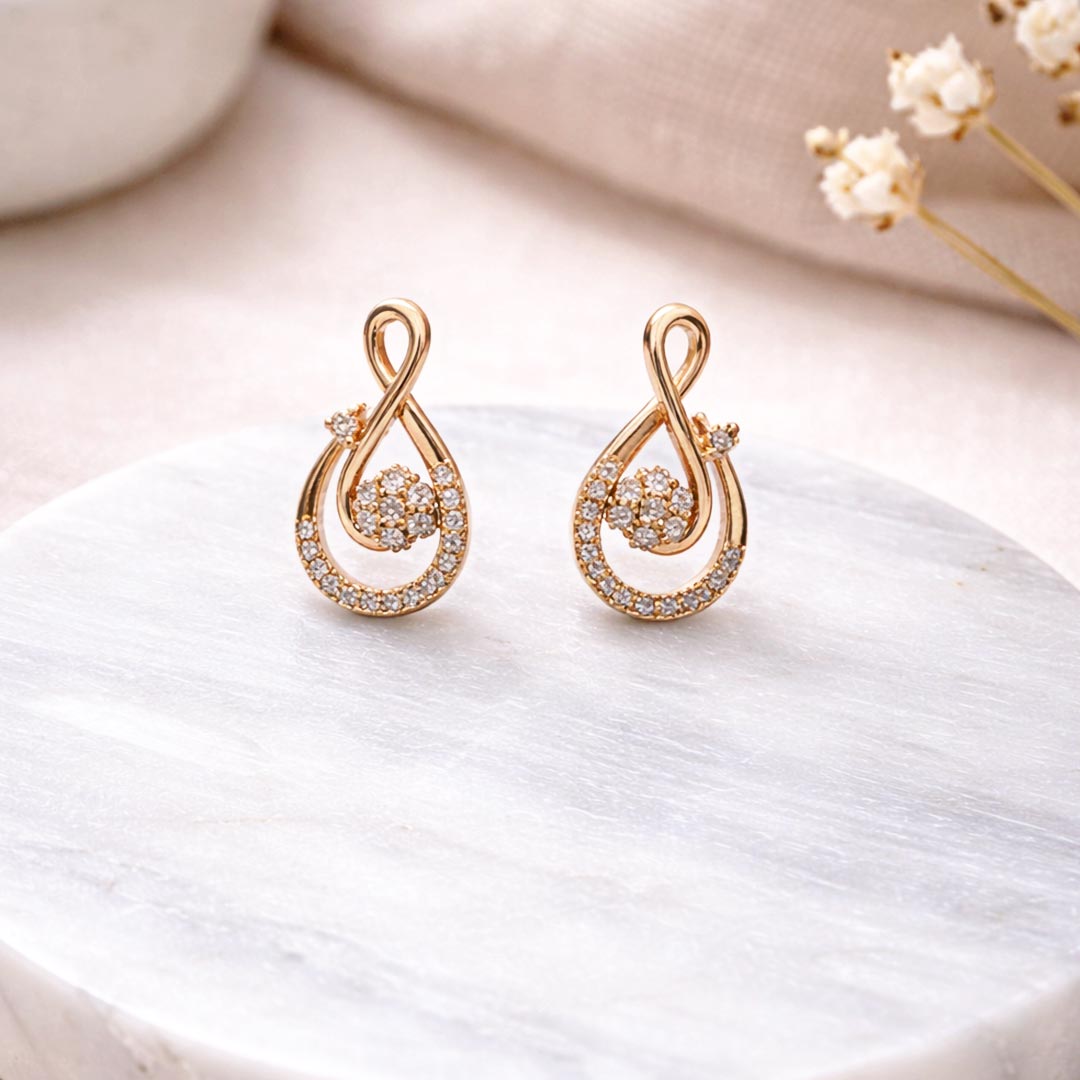 Suwasna Elegant S-Shaped AD Stone Earrings in Floral Design
