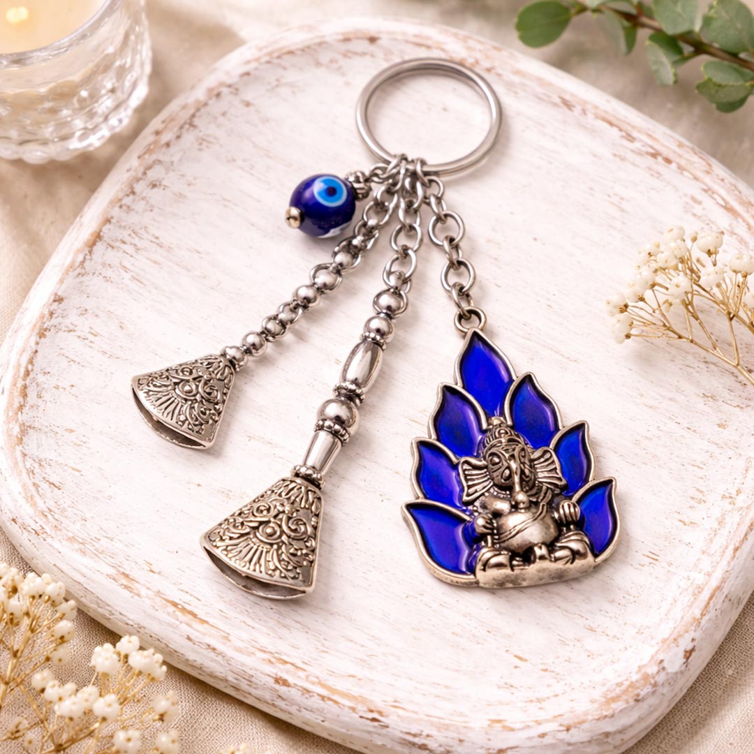 Suwasna Metal Lord Ganesha Evil Eye Bag Charm & Keychain with Mirror Tassel | Boho Ethnic Accessory India