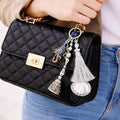 Suwasna Metal Evil Eye Ganpati Ji Trunk Bag Charm & Keychain with Mirror Tassel | Boho Ethnic Accessory India