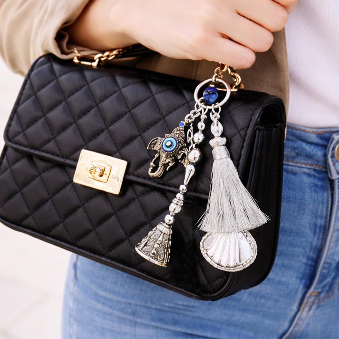 Suwasna Metal Evil Eye Ganpati Ji Trunk Bag Charm & Keychain with Mirror Tassel | Boho Ethnic Accessory India